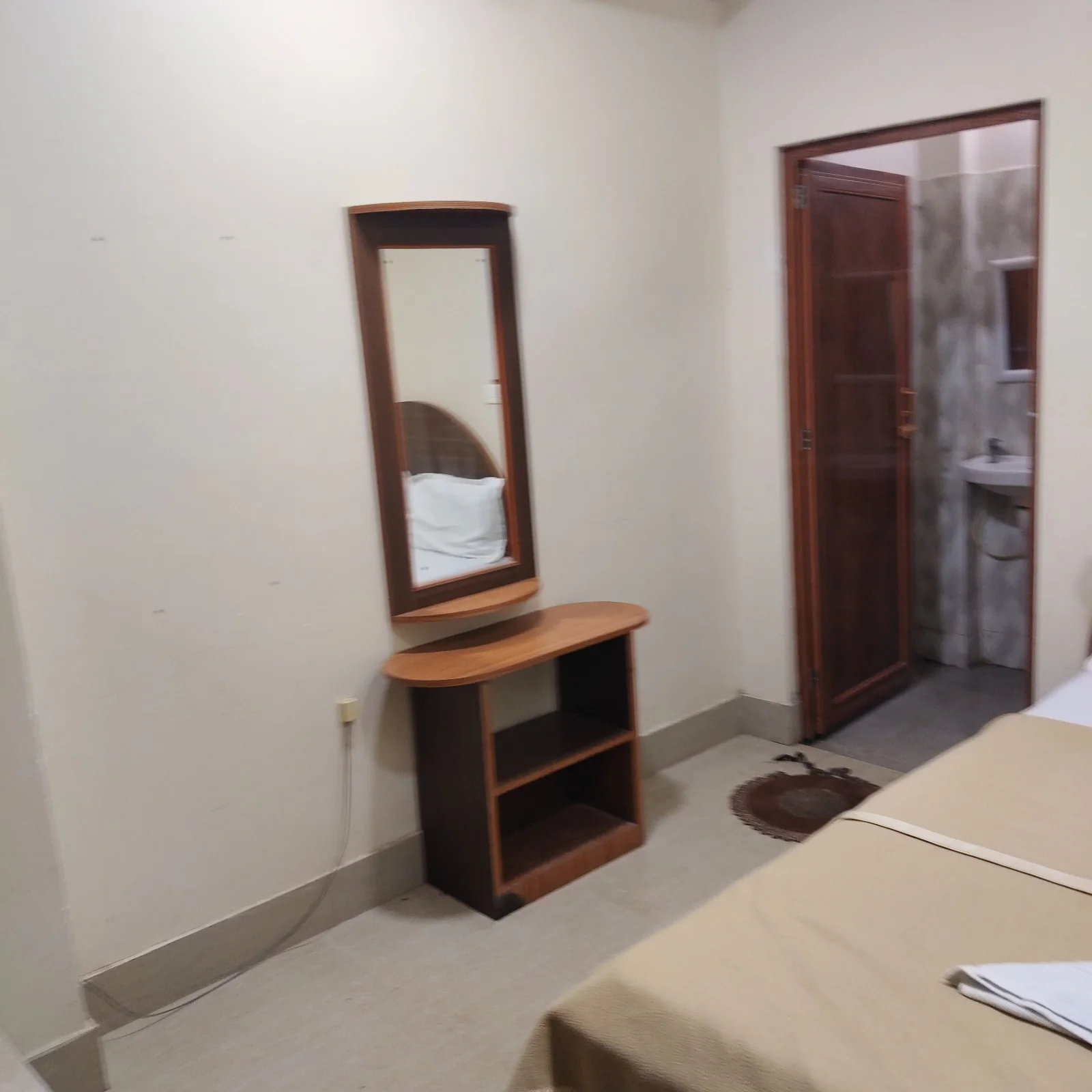 Standard room interior at Hotel Landfall
